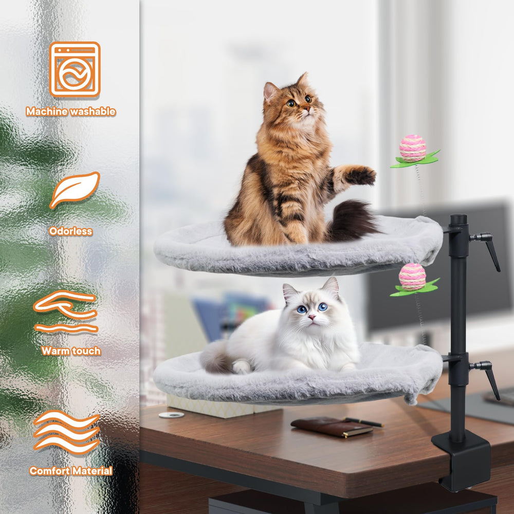 Haijunnm Double Cat Desk Bed includes two cat toys for interactive play sessions.