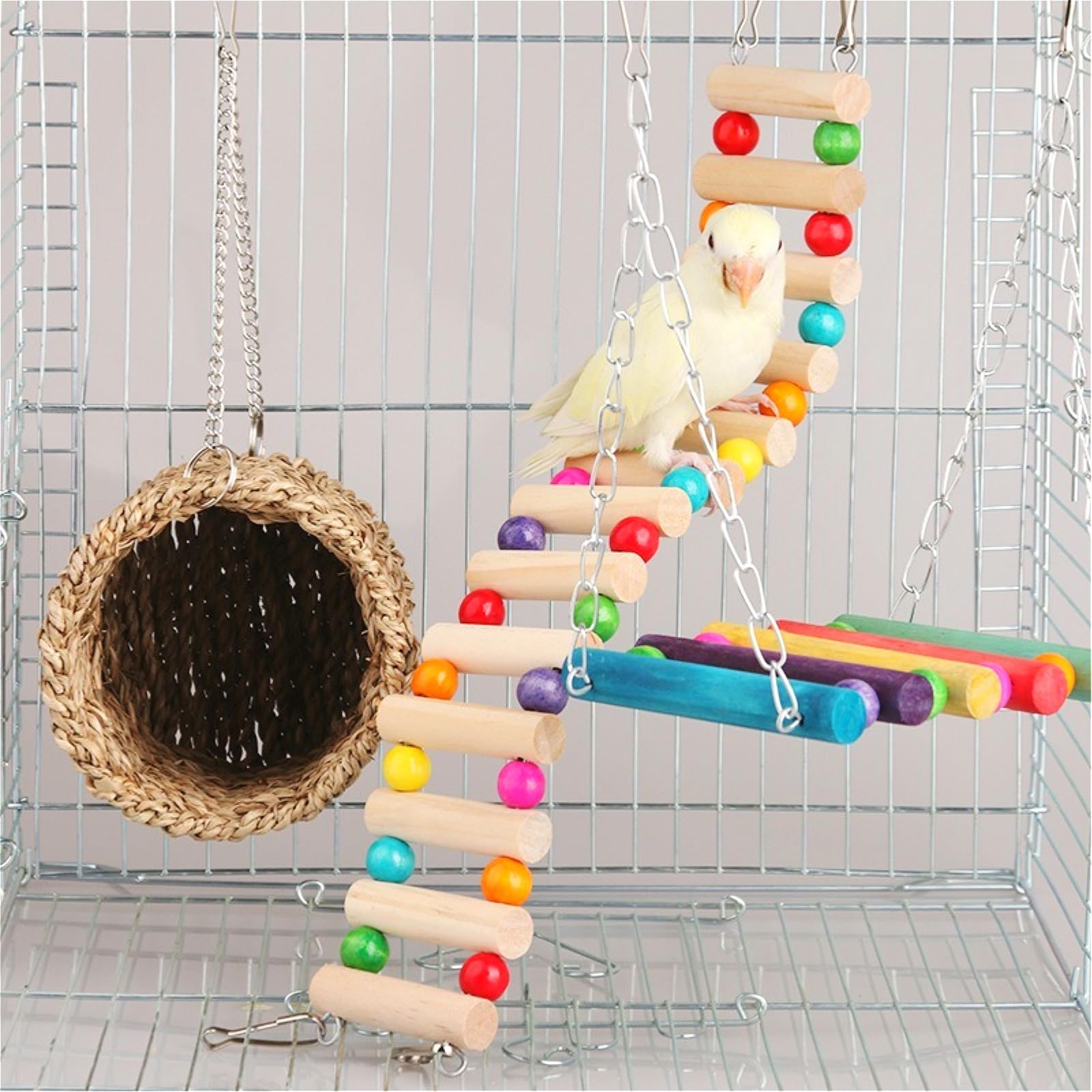 Hamiledyi natural wood straw toy set decorates the cage while offering chewing surfaces.