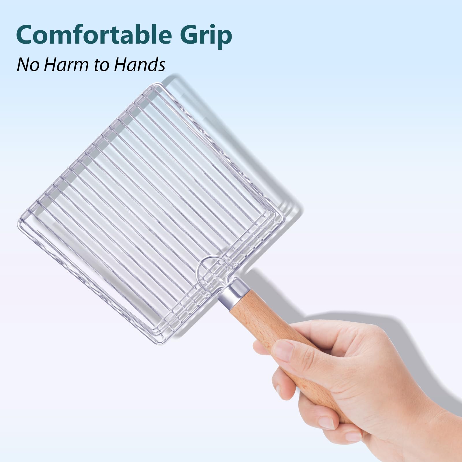 Handzee scoop in use removing clumps for a tidier litter box.