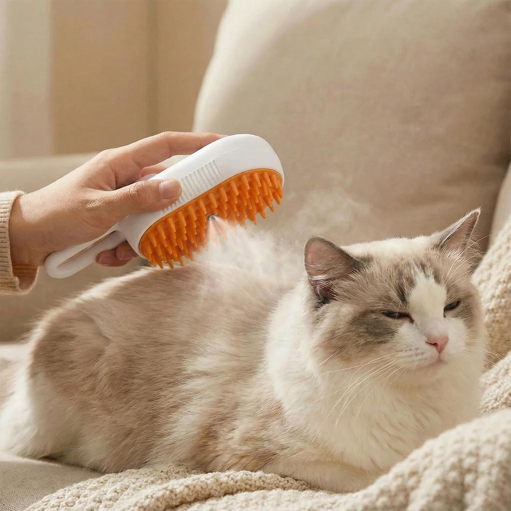 Hanlisee 4-in-1 cat steam brush steam-nozzle close-up highlights soothing micro-steam massaging action.
