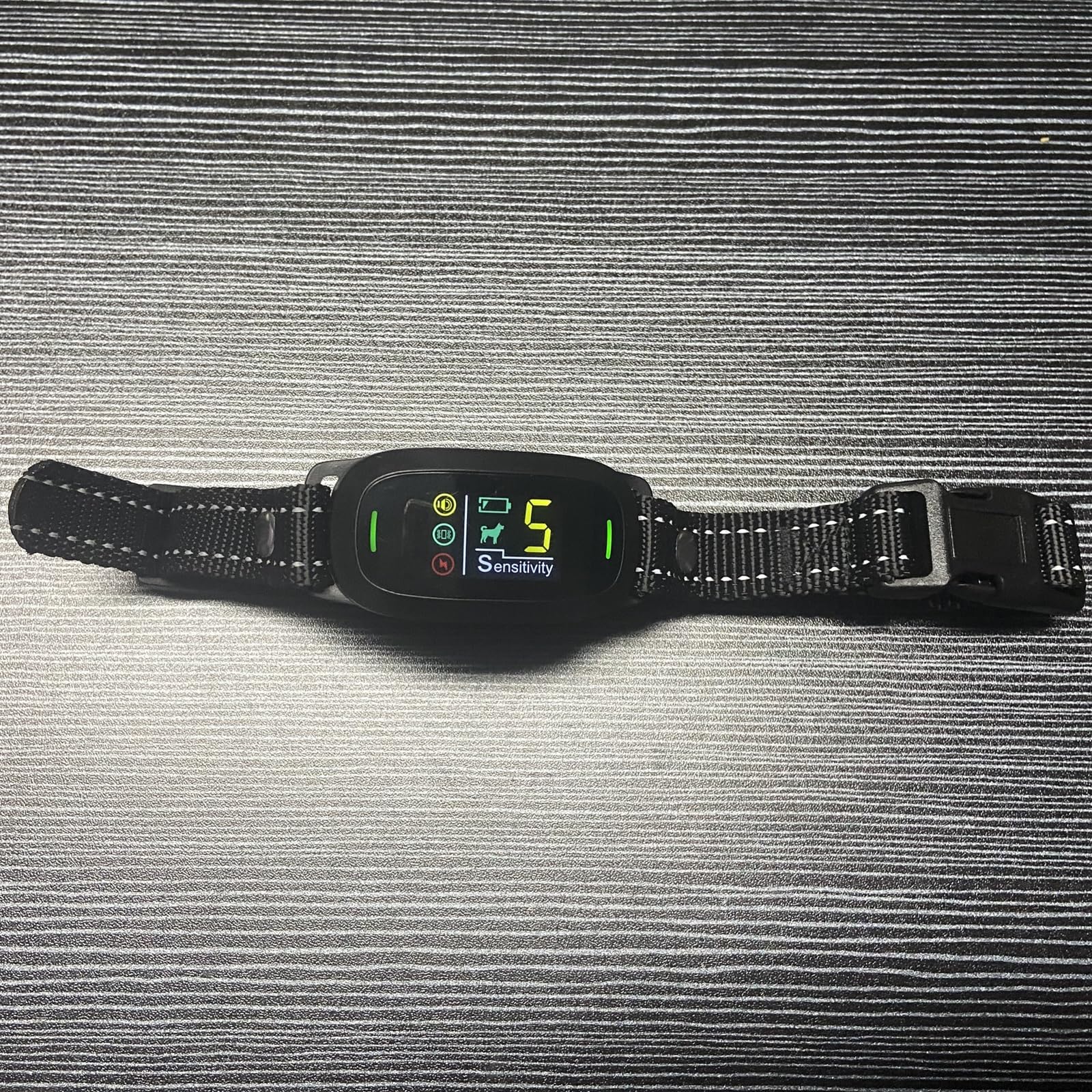 Haourlife S1 cable shown beside collar for neat, portable charging on the go