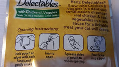 Hartz Delectables Stew closeup highlights chicken and veggies in savory sauce.