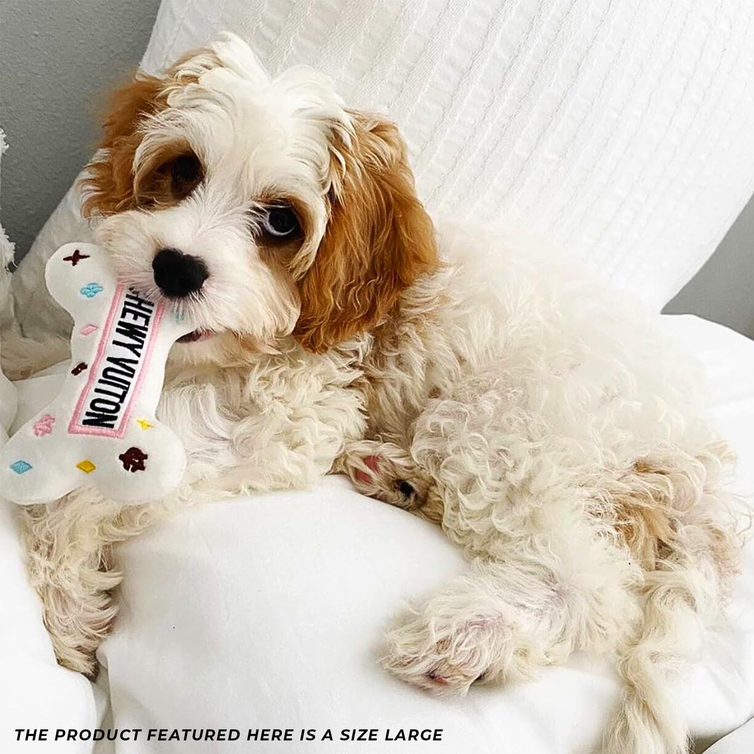 Haute Diggity Dog White Chewy Vuiton Bone machine-washable construction keeps playtime fresh.
