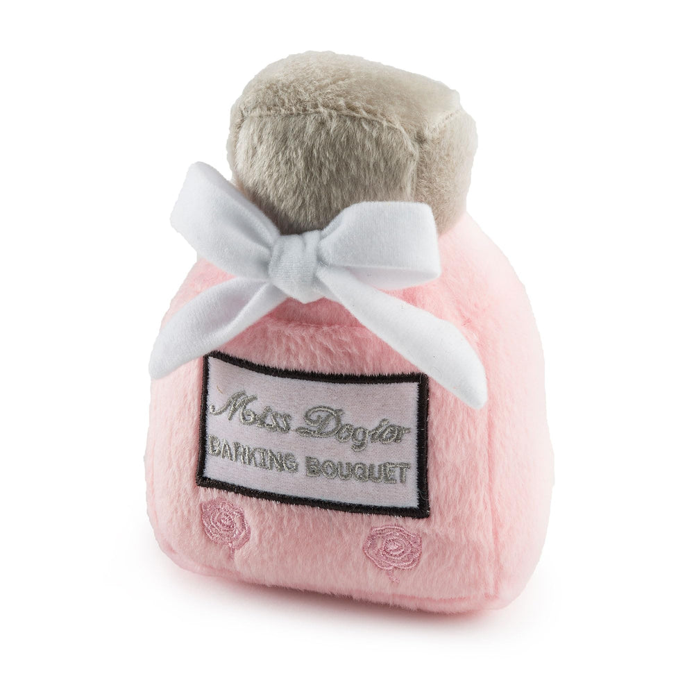 Haute Diggity Dog Miss Dogior perfume bottle toy with pink plush and squeaker for playful engagement.