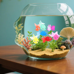 Healifty artificial goldfish texture close-up highlights lifelike scales and rubber finish.