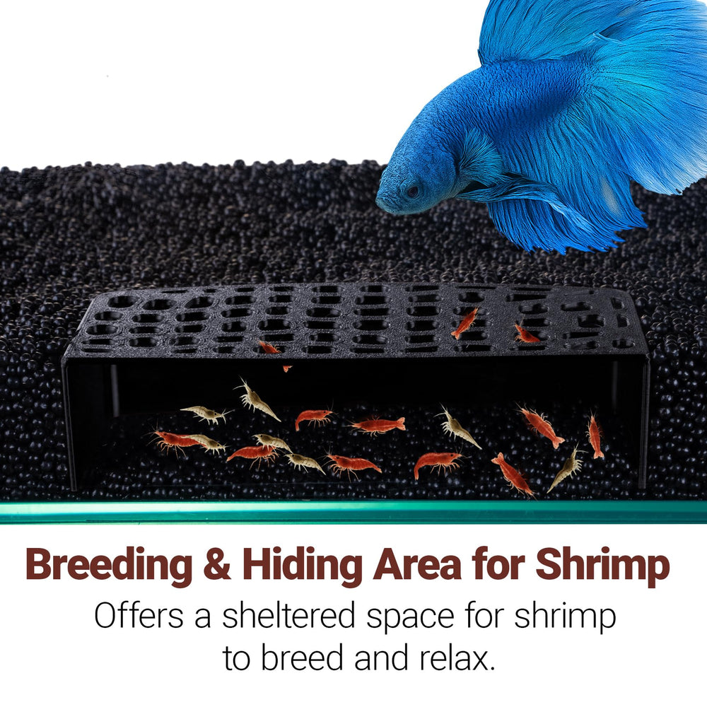 HERPDEN shrimp hide cave tank setup demonstrates natural integration with substrate.