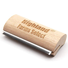 Highland Farms Select deshedding tool wood handle close-up highlighting ergonomic design for gentle grooming
