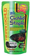 Hikari Cichlid Staple Floating Pellets bottle shows easy-dispense packaging for monitored feeding.
