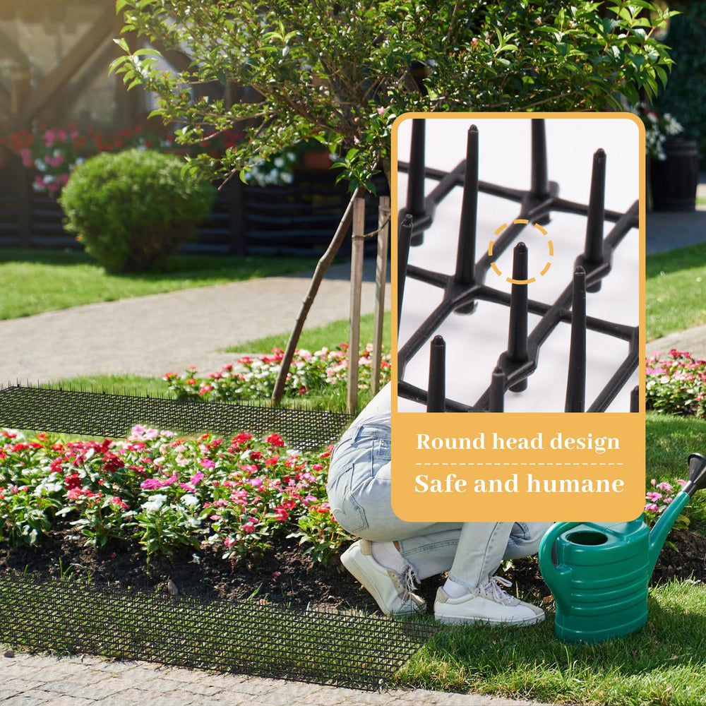 Hmyomina scat mat in backyard setup showing broad deterrent coverage.