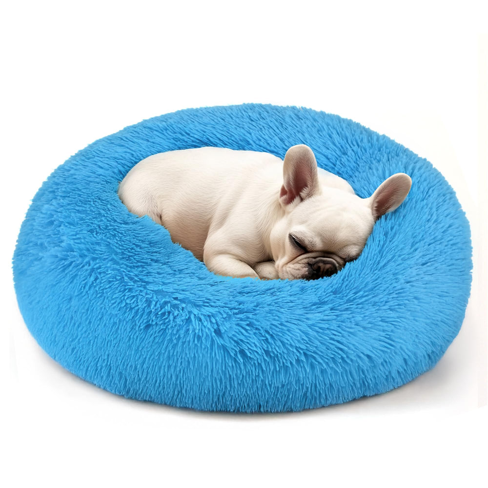 Hoewina round blue bed for pets provides cozy nest-style comfort.