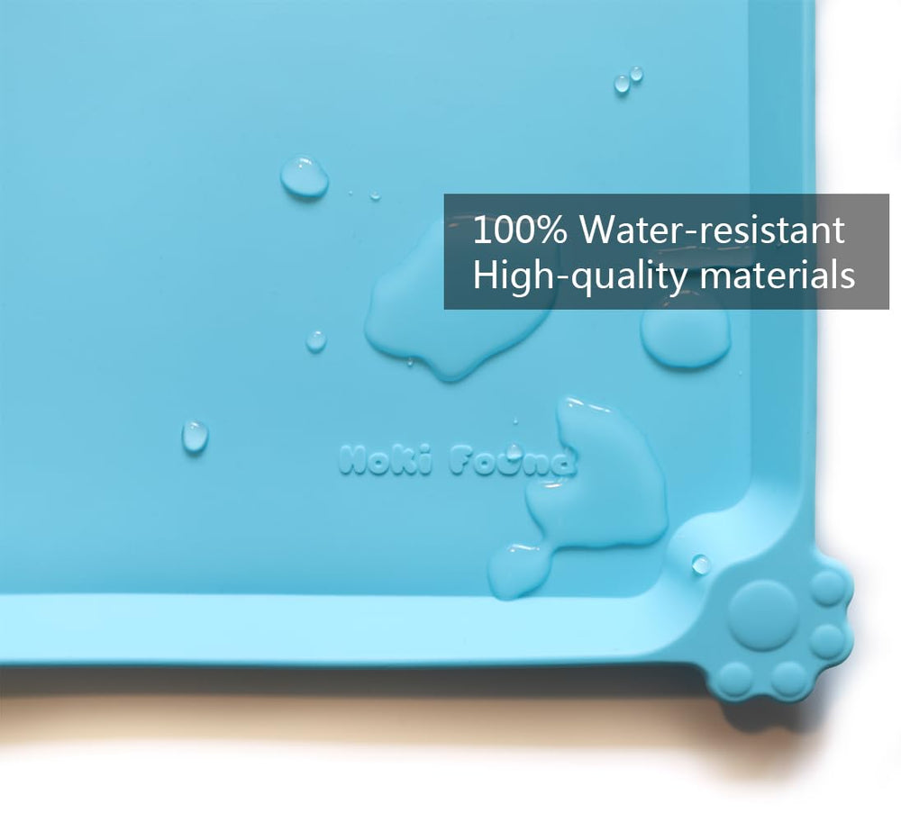 Hoki Found 19x12 inch mat features extra high edge to contain mess.