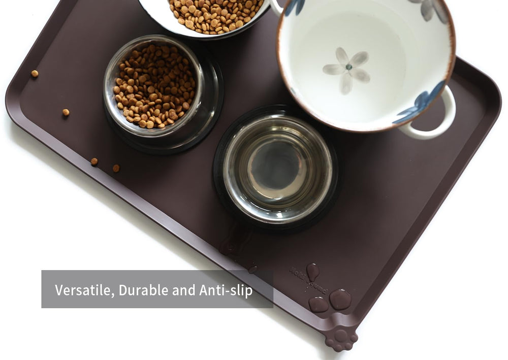 Hoki Found 24x16-inch mat with raised edge catches spills.
