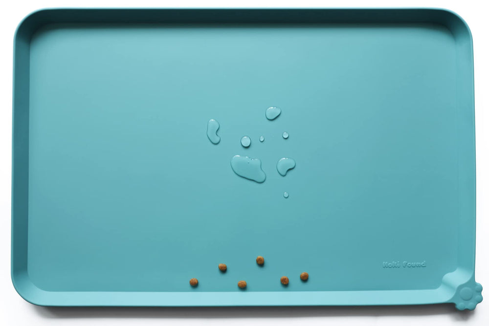Hoki Found alfombrilla silicona para mascotas, vista superior, protege suelos y facilita limpieza.