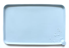 Hoki Found L silicone non-slip bowl mat with spillproof shield protects floors.