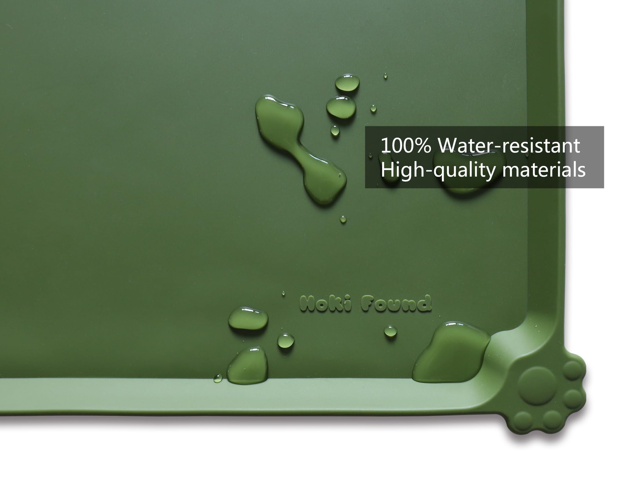 Hoki Found L silicone non-slip bowl mat in dark olive is dishwasher safe for easy cleaning.