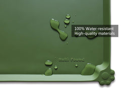 Hoki Found L silicone non-slip bowl mat in dark olive is dishwasher safe for easy cleaning.