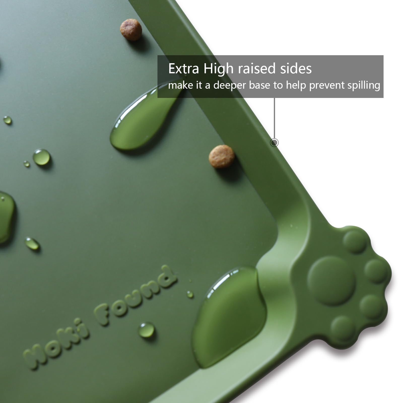 Hoki Found L silicone non-slip bowl mat in dark olive highlights extra-high raised lip to contain spills.