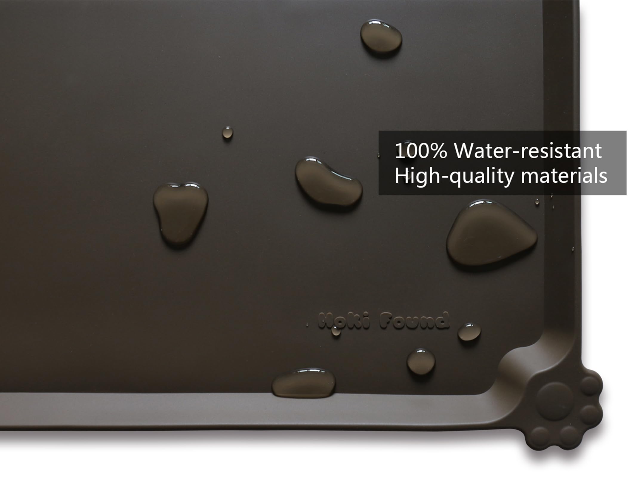 Hoki Found L mat edge detail shows raised lip to reduce spills.