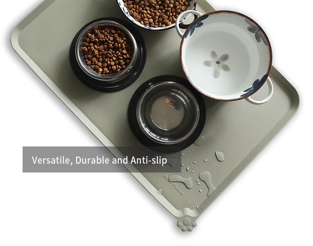 Hoki Found large silicone non-slip pet food mat detail of dish rim and raised edge containment.