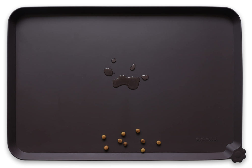Hoki Found large silicone pet food mat in dark oak protects floors during meals.