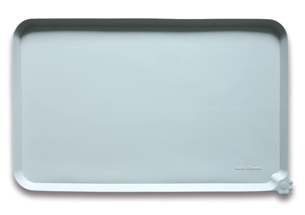 Hoki Found large silicone pet food mat with outer-edge detail helps contain spills and makes cleanup easier.