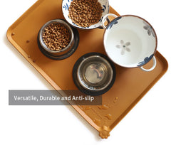 Hoki Found raised-edge mat containing crumbs and drips during meals