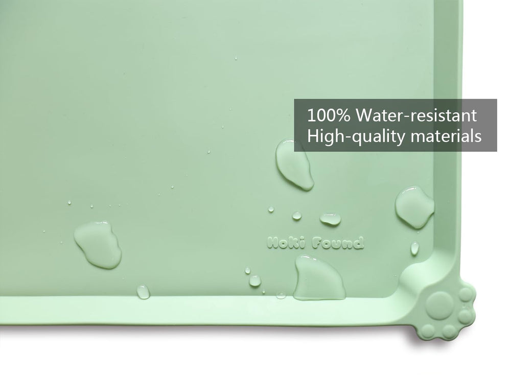 Hoki Found Jade mat with bowl demonstrates raised edge containing spills