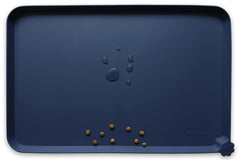 Hoki Found silicone pet food mats tray front view showing high lip prevents spills and keeps floors clean.
