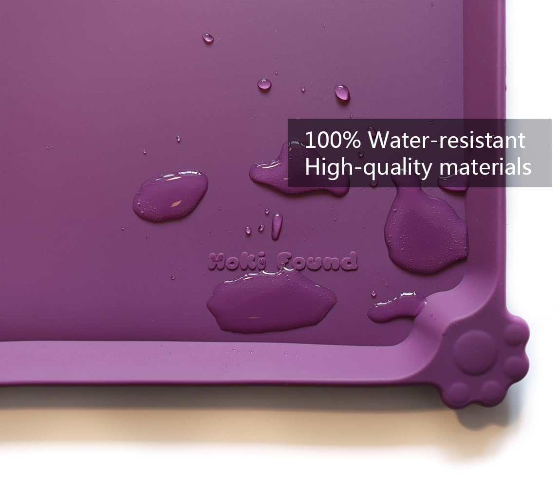 Hoki Found eggplant feeding mat detailed-edge highlights the extra-high raised lip.