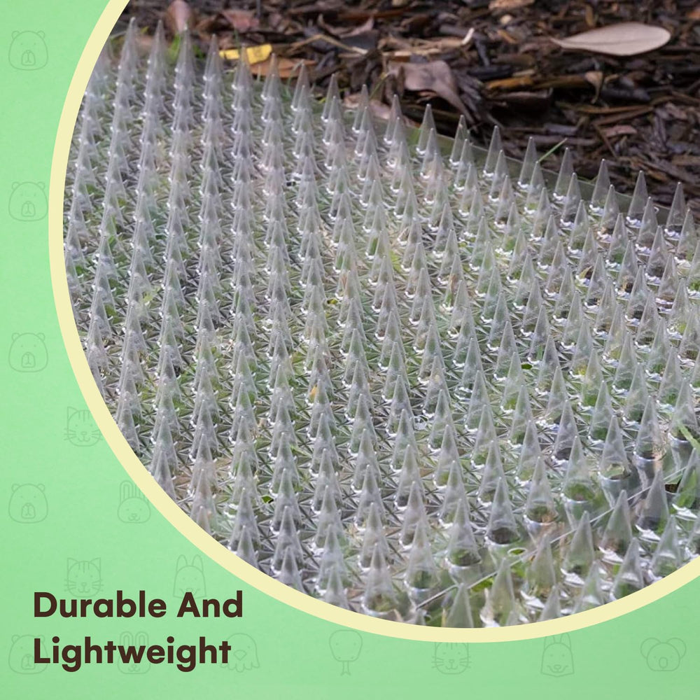 Homarden cat deterrent mats used outdoors to protect garden beds.