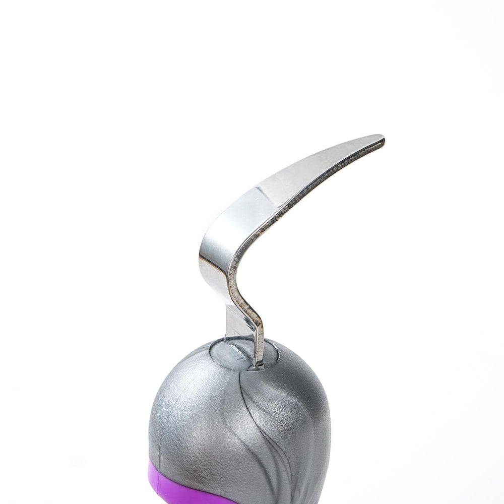 Homcare curved brush aids debris removal from crevices.