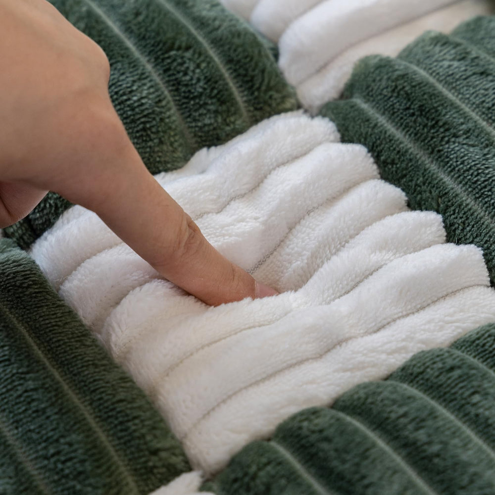 HOMEREFROM close-up of green plaid fabric highlights cozy cushioning