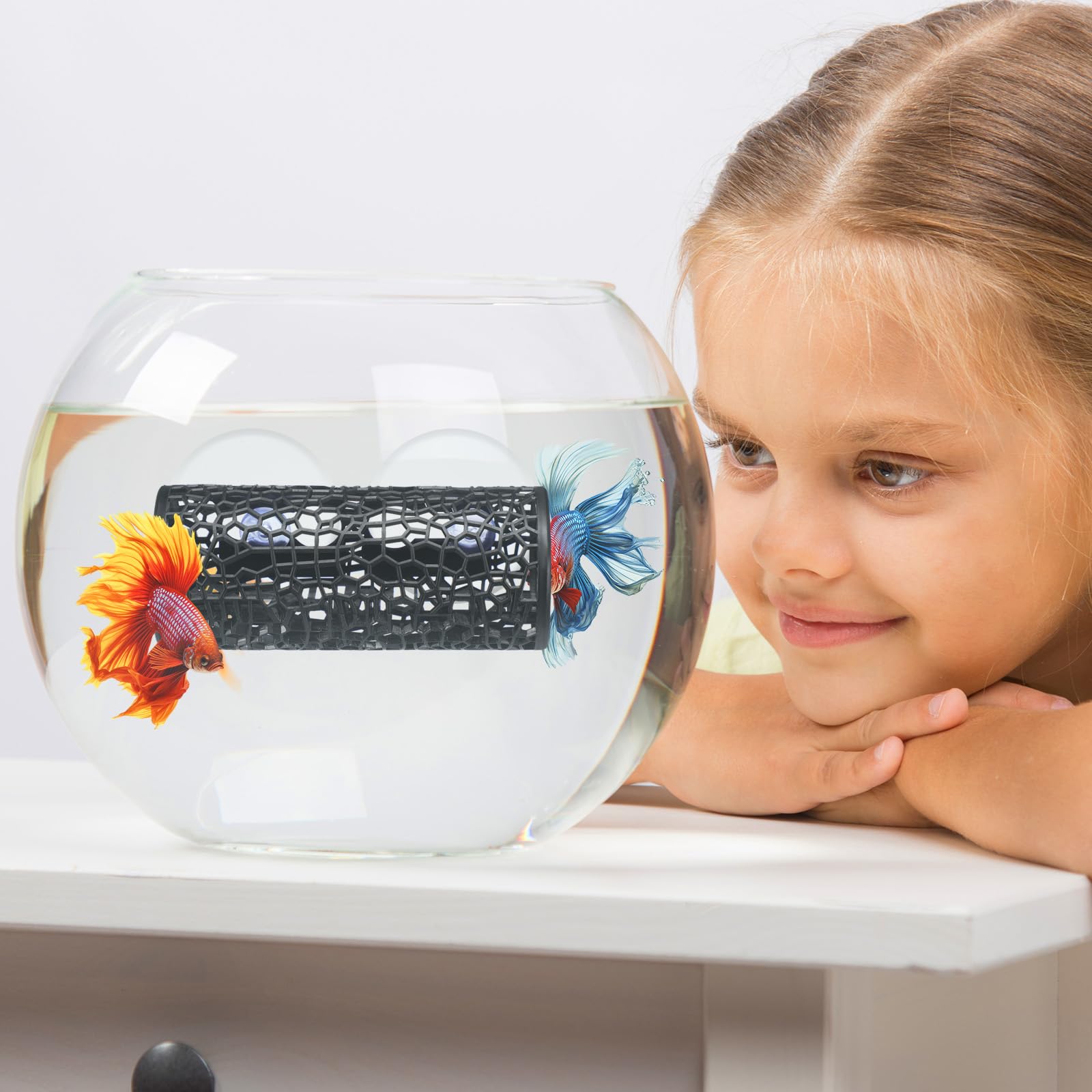 Honeydak Betta Tunnel Sleek black decor adds elegance and depth to your tank.