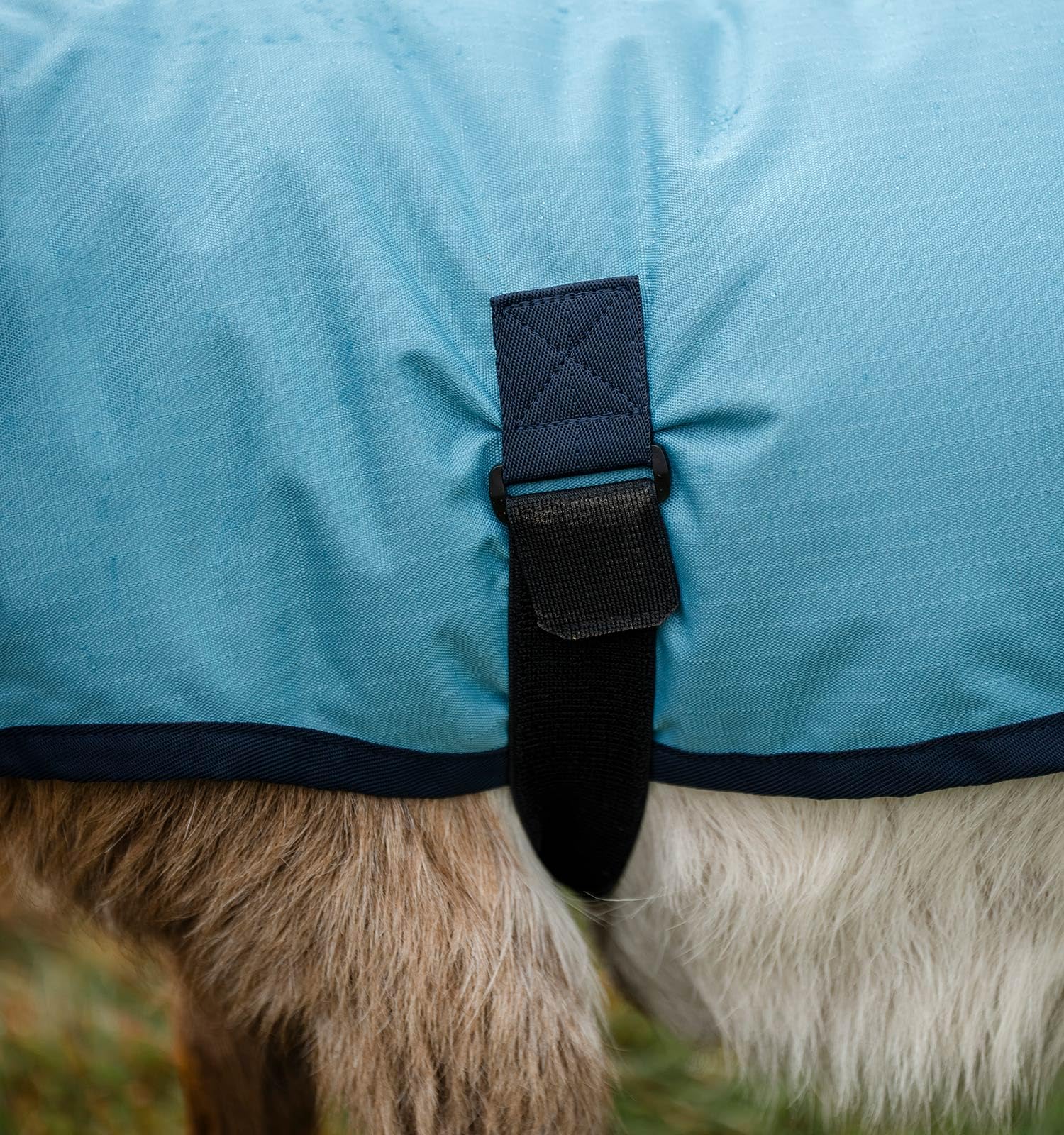 Horseware Goat Coat adjustable belly band ensures secure wrap for varied shapes