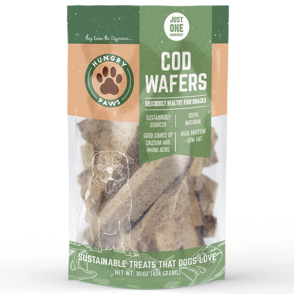 Dog happily enjoys Hungry Paws Cod Wafer as a tasty reward.