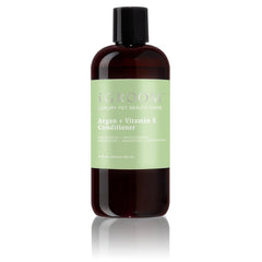 iGroom Argan + Vitamin E Conditioner bottle promotes coat shine and easy detangling.