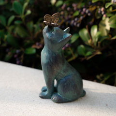iHeartCats Cat Memorial Figurine in garden setting emphasizes a charming, weatherproof keepsake for pet tributes.