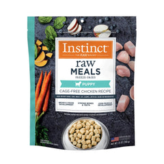 Instinct Raw Meals Freeze-Dried Puppy Chicken bag front emphasizes shelf-stable, high-protein nutrition.