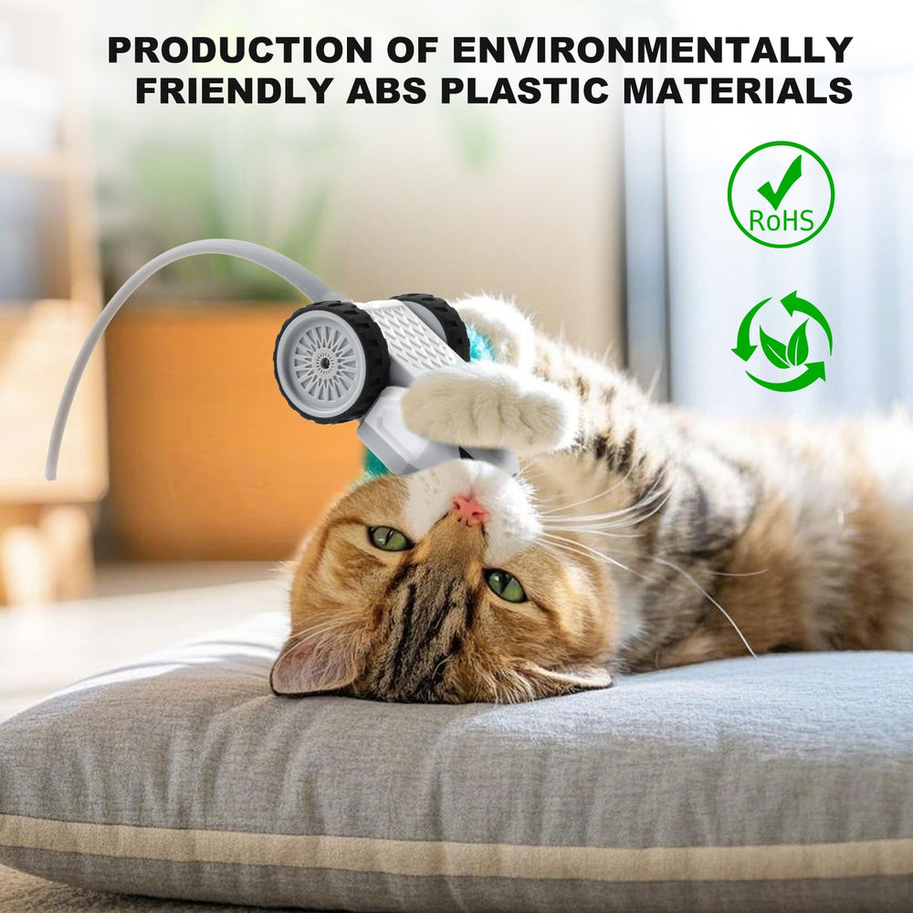 A cat enjoys play with the JANOFT interactive toy in a living room