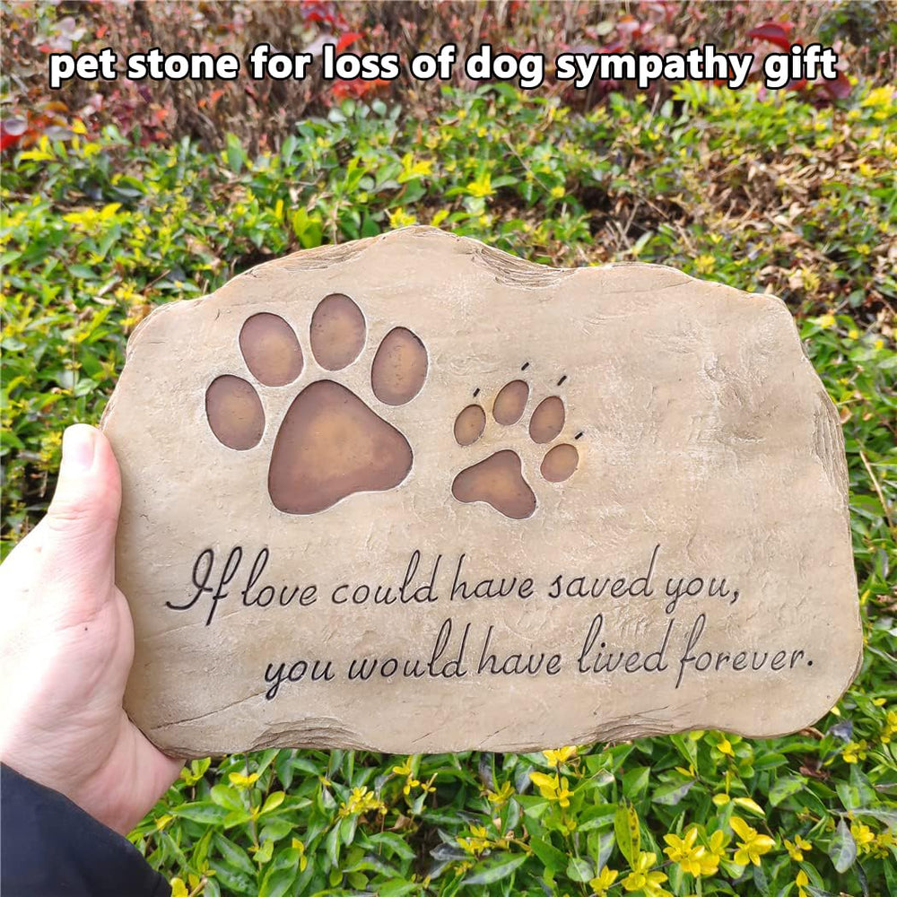Jinhuoba paw prints stone in garden setting, timeless sympathy gift for pet lovers.