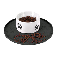 Joyinjojo silicone pet food mat with raised edge prevents spills and protects floors during feeding.