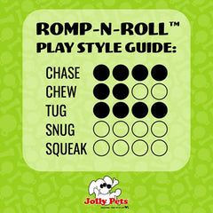 Jolly Pets Romp-n-Roll large blueberry in tug-and-play action outdoors.