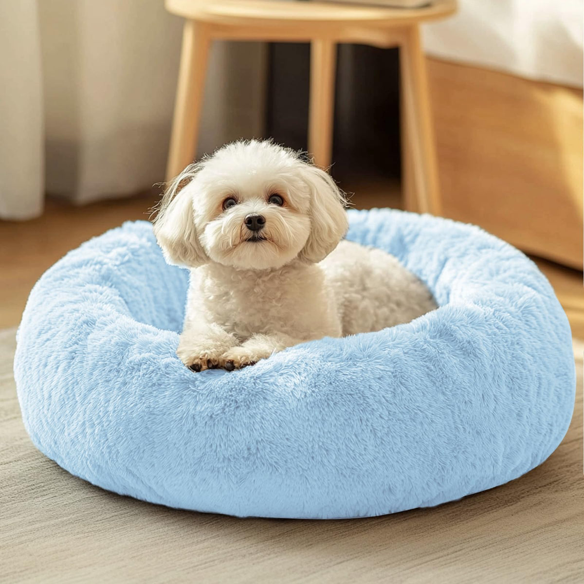JOLLYVOGUE dog and cat bed in plush faux fur offers cozy warmth for pets.