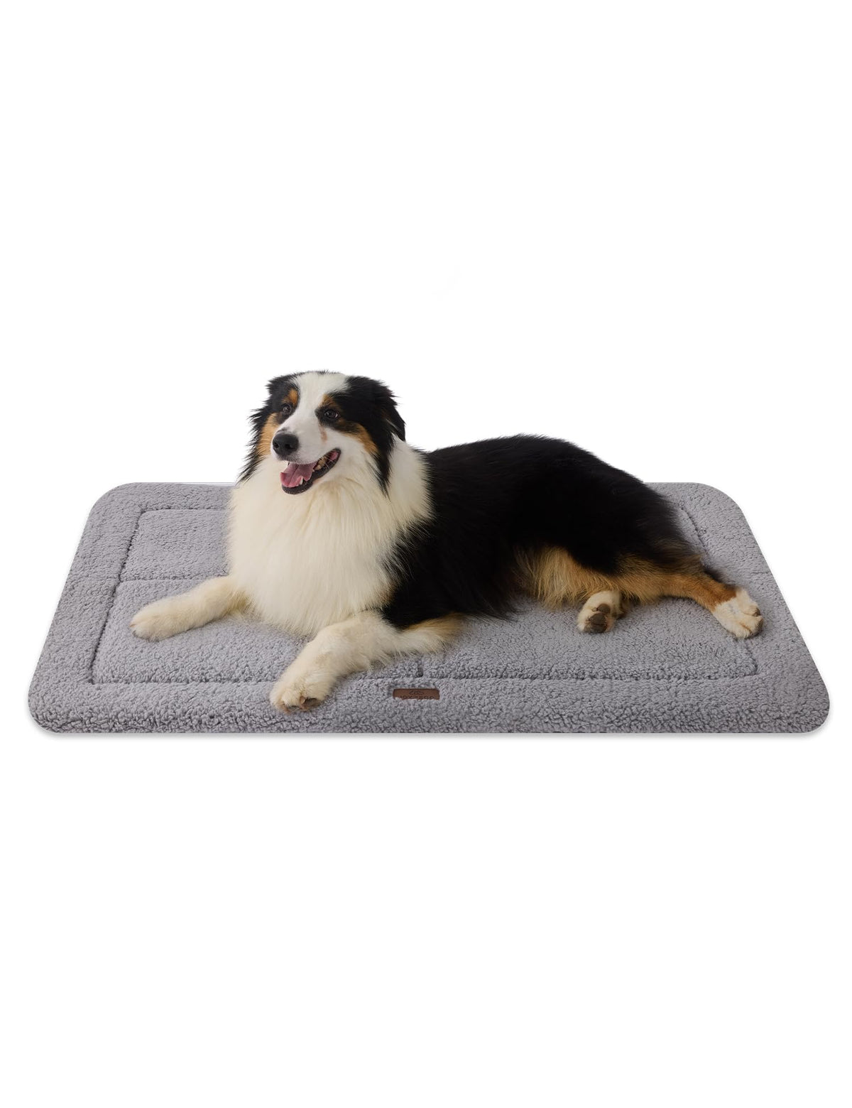 Joydeco low-profile crate mat folded in gray for snug crate comfort.
