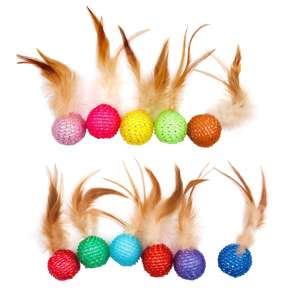 JpGdn closeup of feather accents and bells on a cat toy for sensory cues