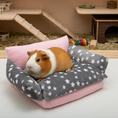 JVVGPET Guinea Pig cuddle spot fleece close-up emphasizes warmth and calm resting.