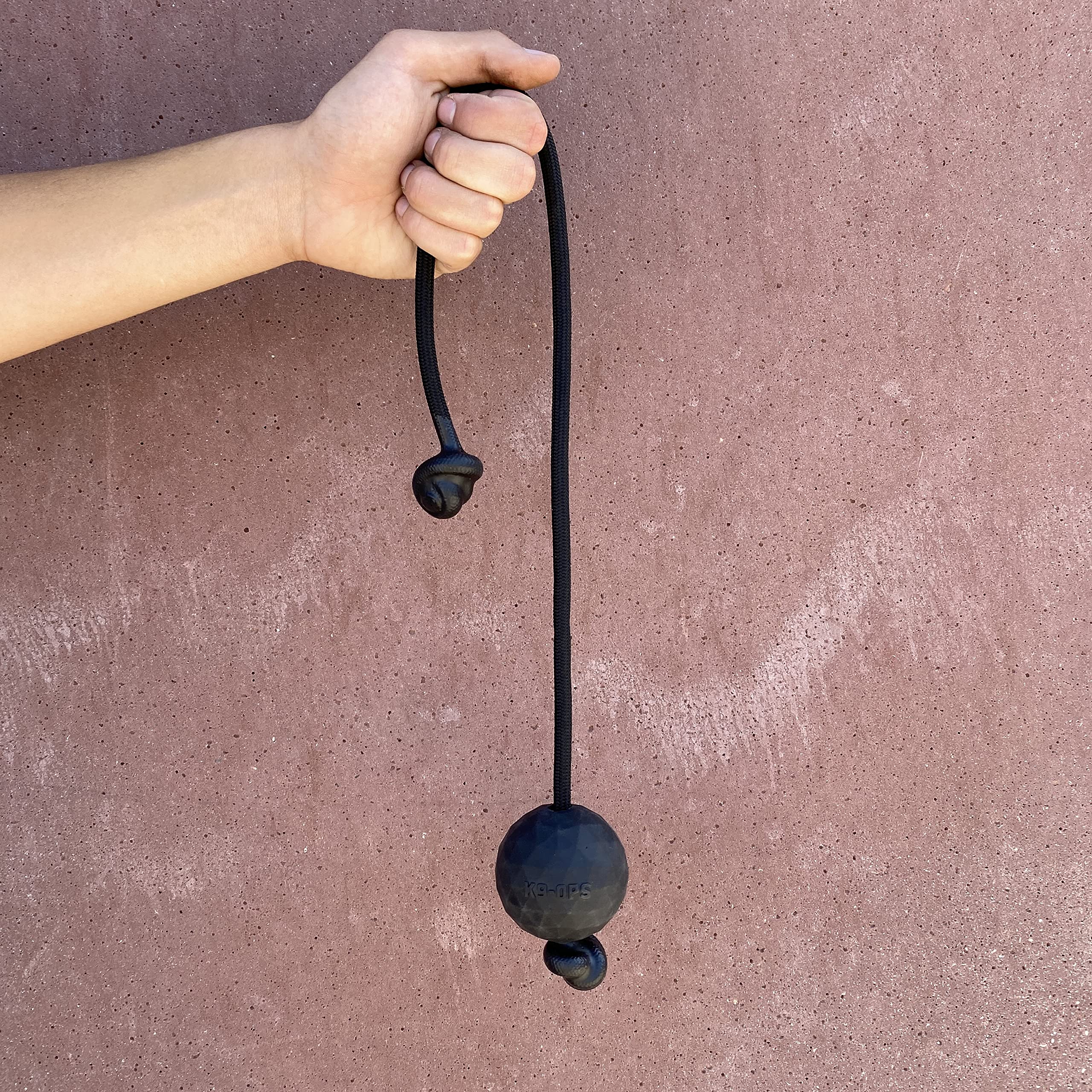 K9 Ops durable rubber ball stands up to aggressive chewers.