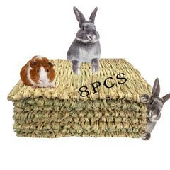 Kathson grass mats inside rabbit cage offer natural bedding and chew surface.