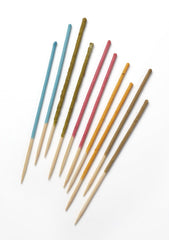 KatsAquatics Shrimpsicles in-tank feeding showcases snails and fish enjoying sticks.