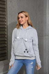 Kei Tomlison hoodie worn by pet and owner demonstrates everyday wearability.